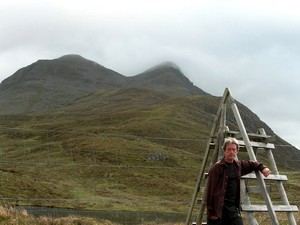 Crossing a fence by the lochan