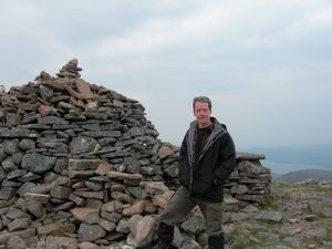 By the summit cairn