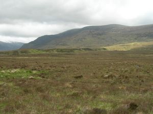 The hills beyond the dried out boggy plain