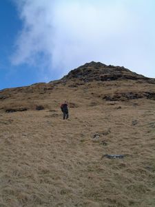 Up the steep grassy hillside