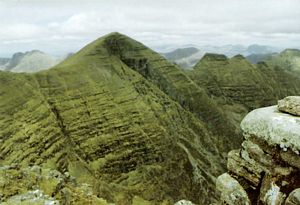 At the top of Tom na Gruagaich with Sgurr Mhor behind